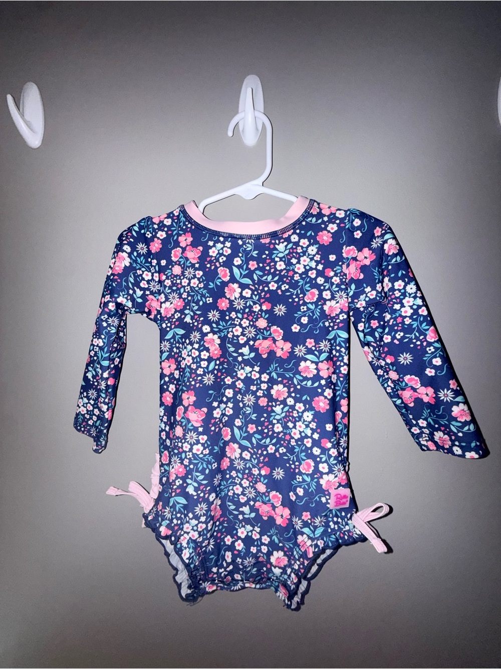 Ruffle Butts Navy & Pink Floral Long-Sleeve One-Piece Swimsuit